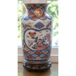 A Japanese Imari vase, late Edo period, of ovoid form with everted rim, painted in underglaze blue