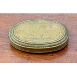 A Dutch brass snuff box, 17th/18th Century, of oval form and engraved with portraits and floral