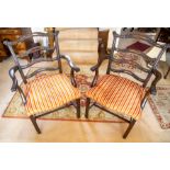 A pair of good reproduction Chippendale style ribbon back open armchairs, with carved scroll rails