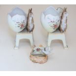 A pair of German bisque porcelain miniature figural vases and another smaller. (3)