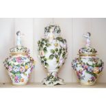 A pair of Meissen style vases and covers,