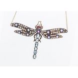 A multicoloured gemstone and 18ct gold dragonfly necklace, the tail comprising a row of oval cut
