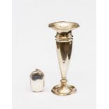A silver vesta case, maker unknown, circa 1902, of plain ovoid form, 4.5cm, together with an