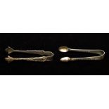 A pair of Victorian silver sugar tongs, London 1885, engraved with scrolling foliage, 0.6oz,