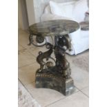 A reproduction Empire style mixed granite occasional table, modern, the circular top with polished