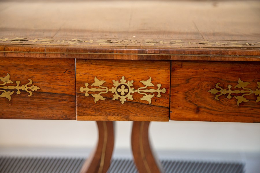 A Regency rosewood and brass inlaid sofa table, - Image 2 of 2