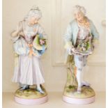 A pair of Paris bisque porcelain figures of a lady and gallant, circa 1900, modelled standing and