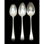 A pair of George III dessert spoons, William Eley, London 1800 and 1802, Old English pattern and