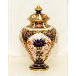 A Royal Crown Derby Imari miniature vase, dated 1923, of amphora shape and decorated with pattern