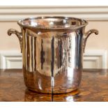 An electroplated ice pail of plain form with twin scroll handles, 17cm high.