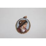 A 19th Century portrait pendant in a gilt metal mount, the porcelain panel painted with the