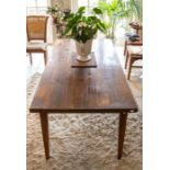 An oak refectory type table, modern, the plank top raised on tapering square supports, 76cm H, 183cm