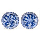 A pair of Spode blue and white saucer dishes, circa 1825-35, of plain rounded form and decorated