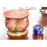 An Art Nouveau style glazed pottery jardiniere, together with a glass paperweight. (2)