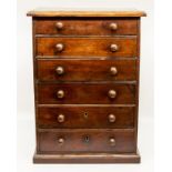 A 19th Century mahogany apprentice or specimen chest of drawers, the moulded top above six long