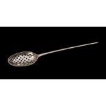 A late 18th Century silver mote spoon, indistinctly marked, the oval bowl with floret piercings, the