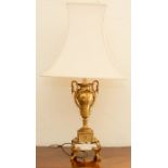 A reproduction French gilt metal and marble table lamp,