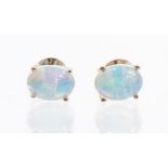 A pair of Ethiopian opal silver stud earrings, the opals measuring approx. 8mm x 6mm, green and pink