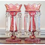A pair of Bohemian ruby glass lustres,