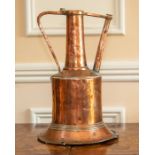 A near Eastern copper watering can.