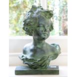 A modern composite verdigris effect bust of a boy, 30cm high.