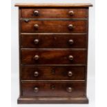 A 19th Century mahogany apprentice or specimen chest, the moulded top above six long slightly