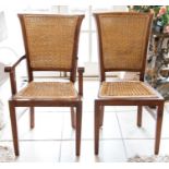 A set of six (4+2) rush-seated teak dining chairs. (6)