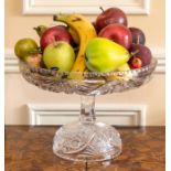 A cut glass two-part fruit bowl.