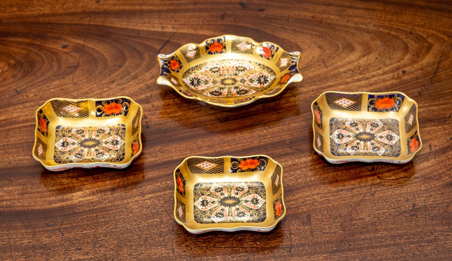 A small Royal Crown Derby Imari oval dish, 14cm and three rectangular pin or sweet trays, all
