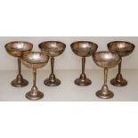 A set of six electroplated goblets, 20th Century, the rounded bowls engraved with cartouches above