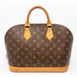Louis Vuitton- A Louis Vuitton monogram 'Alma' handbag monogrammed exterior trimmed with tan