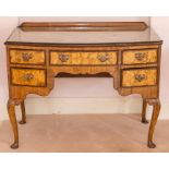 A George I style quarter veneered walnut dressing table, together with a walnut stool with drop-in