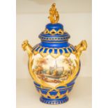 An English porcelain vase and cover, mid-19th Century, of ovoid form with twin scroll handles,