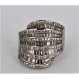 An 18ct white gold and diamond set ladies dress ring, mid 20th Century, set with five rows of