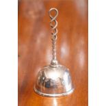 An American silver bell dated 1896.