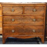 A George III mahogany chest of drawers, the reeded edge top above two short and two long cock-beaded