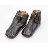 A pair of boys brown leather ankle boots with elasticated tops, square toes, early 1900's British