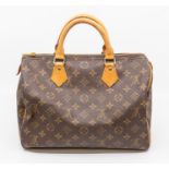 Louis Vuitton- A Louis Vuitton  monogram 'Speedy' handbag, monogrammed exterior trimmed with tan