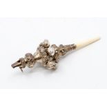 A Victorian silver baby's rattle and whistle, Birmingham circa 1880-85, of typical knopped form with