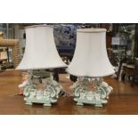 A pair of Minton glazed bi-colour parian figural table lamps, dated 1872, probably converted from