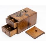 A 19th Century oak travel spice box, of rectangular outline with rounded top and plain brass carry