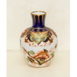 A Royal Crown Derby Imari miniature vase, dated 1927, of ovoid form and decorated with pattern 3145,