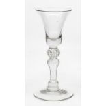 A 'Newcastle' type balustroid wine glass, circa 1750-60, the bell bowl set on a slender stem with an