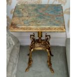 A small onyx and gilt metal occasional table, modern, of square form and raised on leaf scroll
