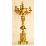 A pair of French Empire style gilt metal figural four-branch candelabra, circa 1890, modelled as