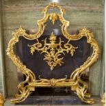 A French gilt brass rococo revival fire guard,