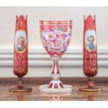 A pair of Bohemian ruby glass and overlay stem vases,