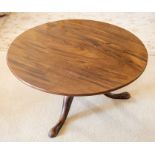 A 19th Century mahogany tilt-top tripod table, the circular top on a knopped stem, reduced, raised