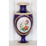 An English porcelain vase, circa 1900, of amphora shape with everted rim, painted with flower sprays