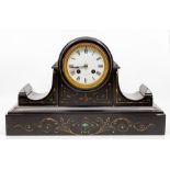 A French black marble mantel clock, circa 1890, the barrel-topped architectural form case